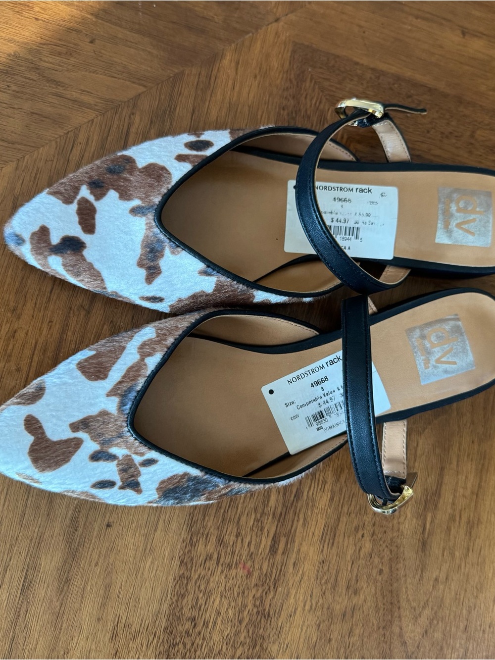 Dolce Vita Pointed Cow-Print Mules in White & Brown with accent straps